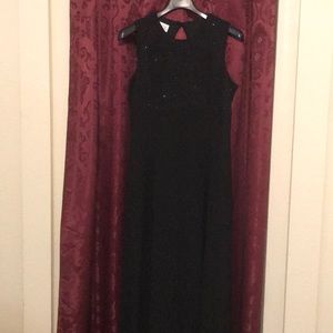 Evening gown with three dimensional sparkle top